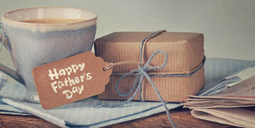 Gift,Box,With,A,Tag,And,A,Cup,Of,Coffee